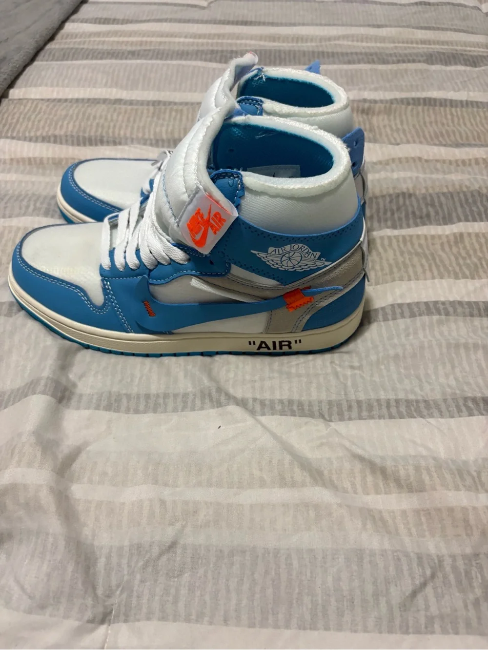 Jordan Men’s High-Top Sneakers in White and Blue with Orange Accents
